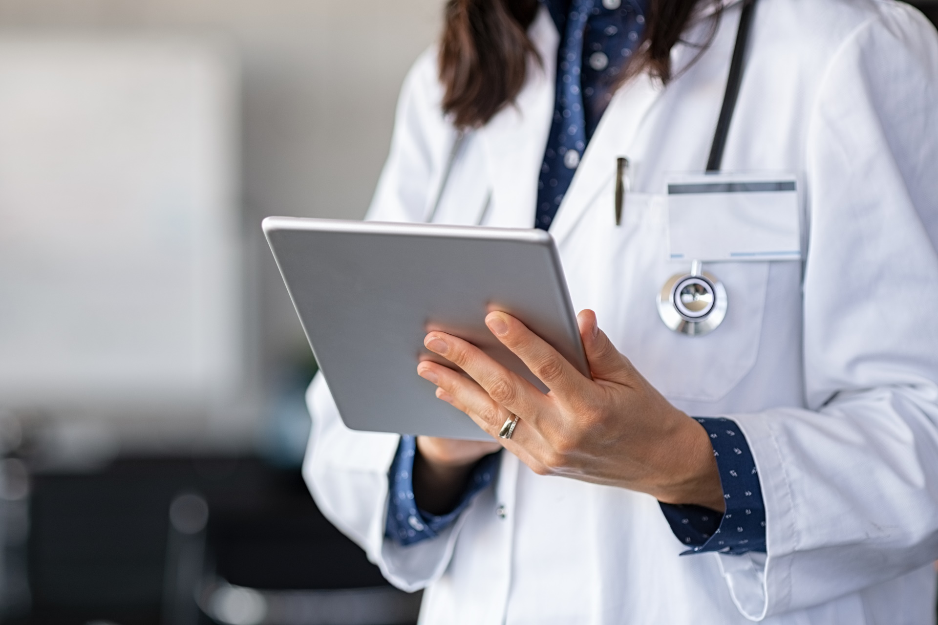 Doctor using digital tablet